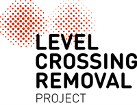 2 red signal crossings with an overlaid heading - level crossing removal project-