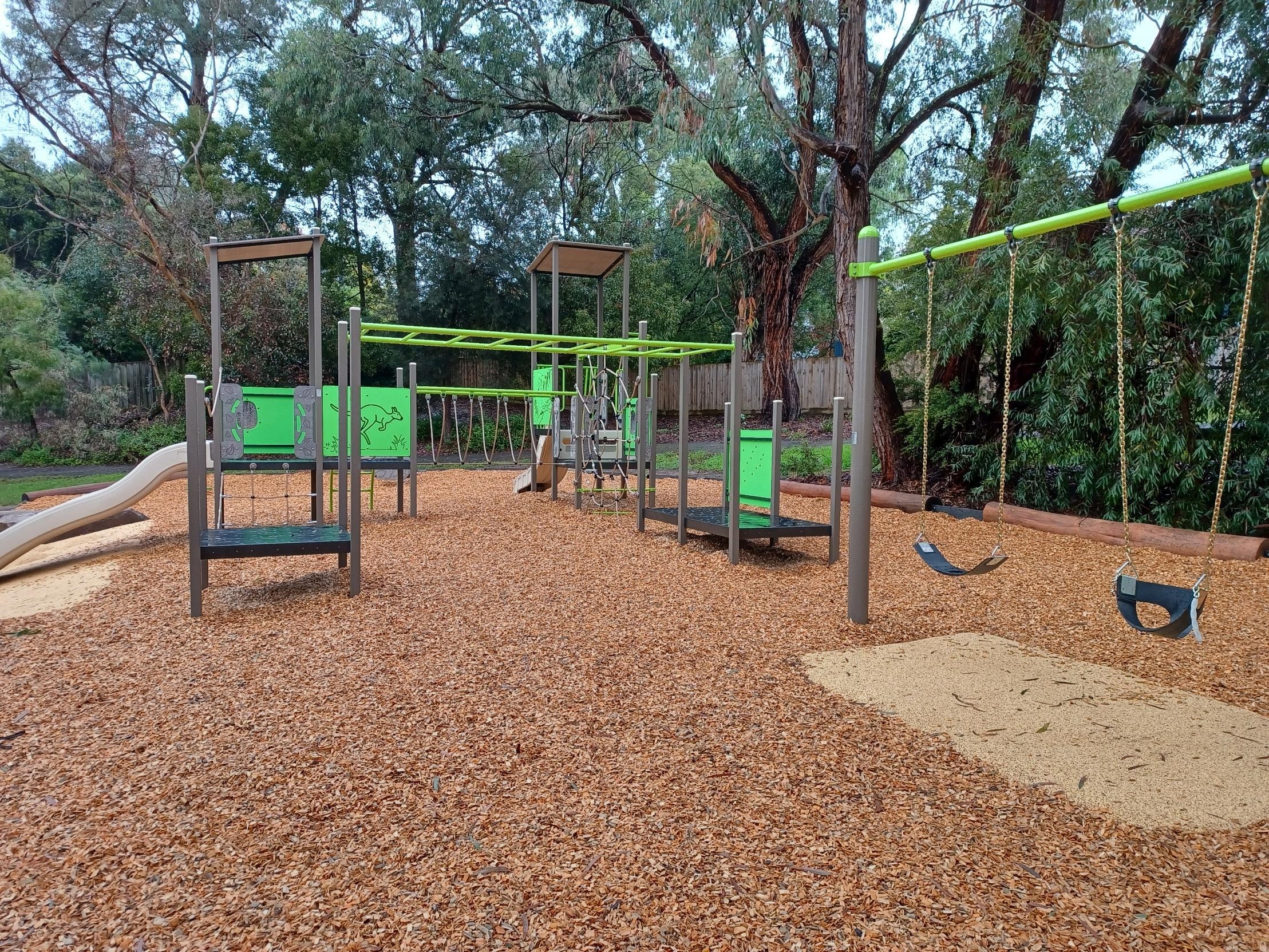 The new San Martin playspace includes swings, play equipment and slide