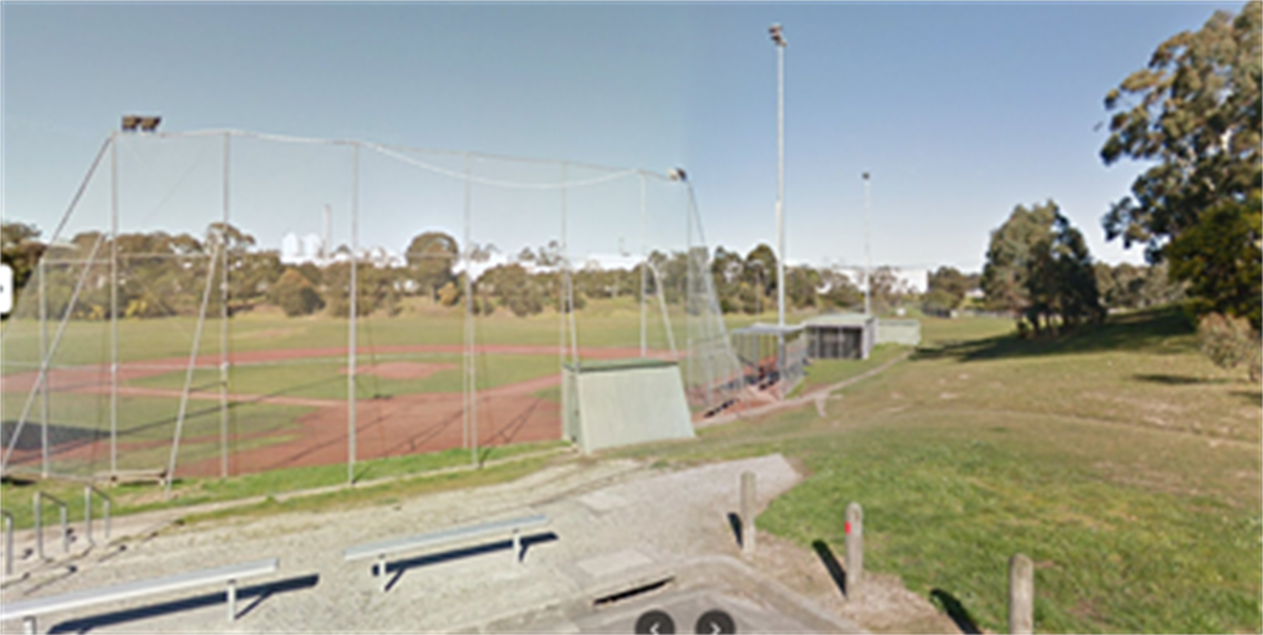 seats positioned alongside an oval, with high netting installed to protect spectators from rogue balls