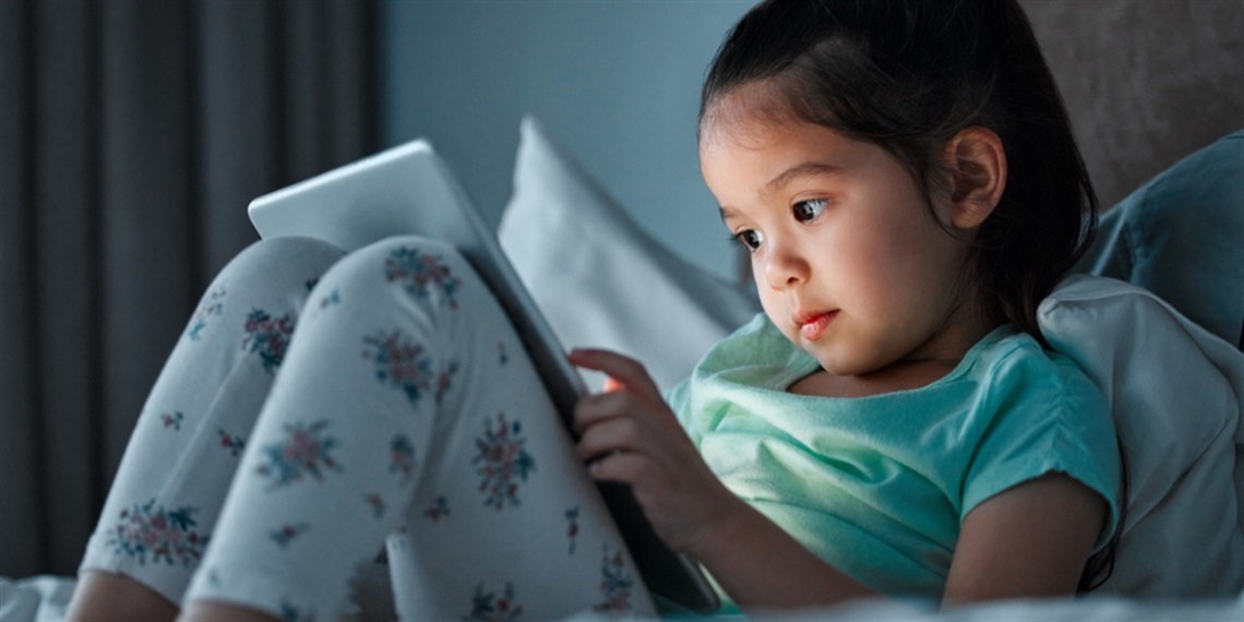 Young child on an iPad