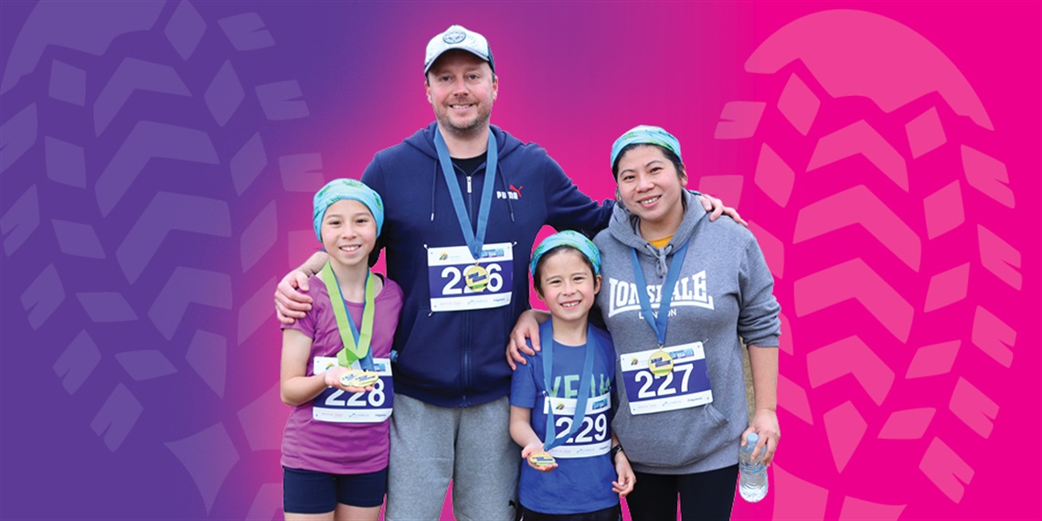 A family wearing their athletic gear with Run Maroondah medallions around their necks