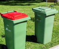 two bins with a red and green lid