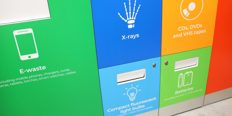 Close up photo of colourful recycling station at Realm